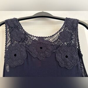 Dark blue crochet yoke dress.
